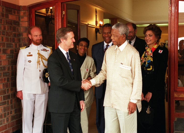 Secretary of Defense William S. Cohen and Nelson Mandela