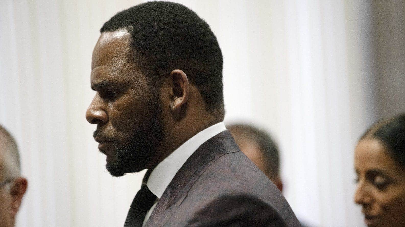 R. Kelly witness says she was forced to smear feces on her face and urinate  in a cup