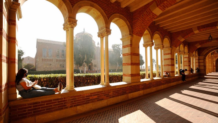 Students and lecturers gathered at UCLA Bruin Plaza to celebrate with s rally after a strike was averted Wednesday morning. Lecturers across the UC system were planning to strike Wednesday and Thursday over unfair labor practices.