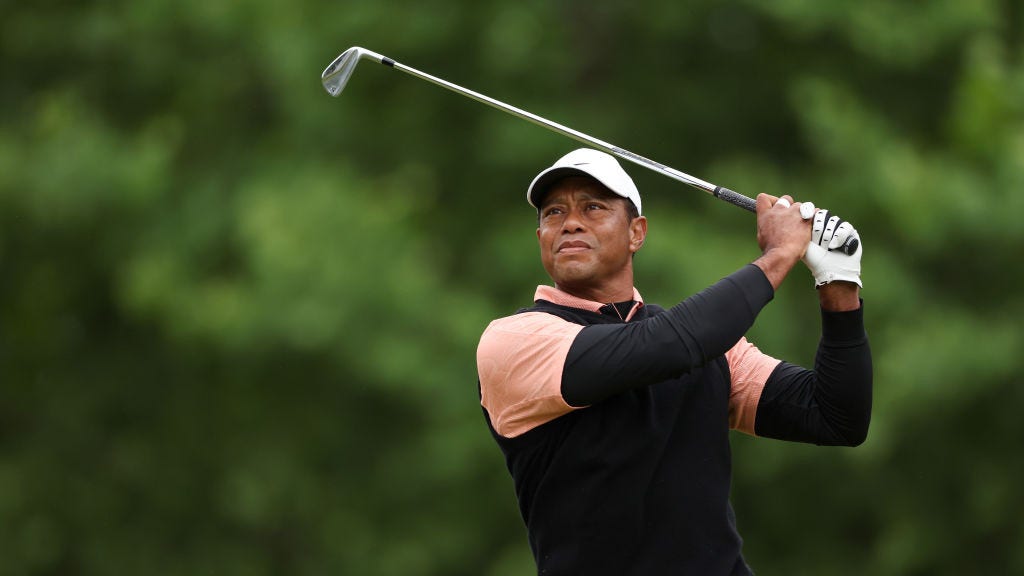 Tiger Woods swings into billionaire status