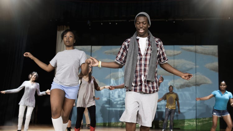 Teenagers rehearsing in dance class