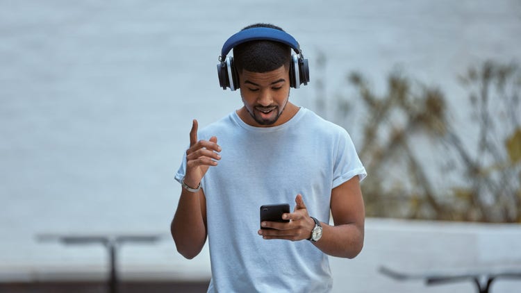 Man streaming music on his phone