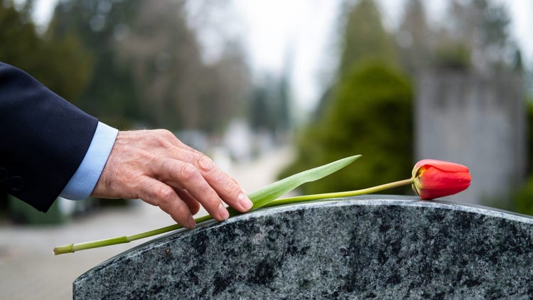 flower on tombstone