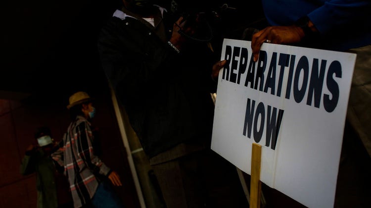 reparations now sign