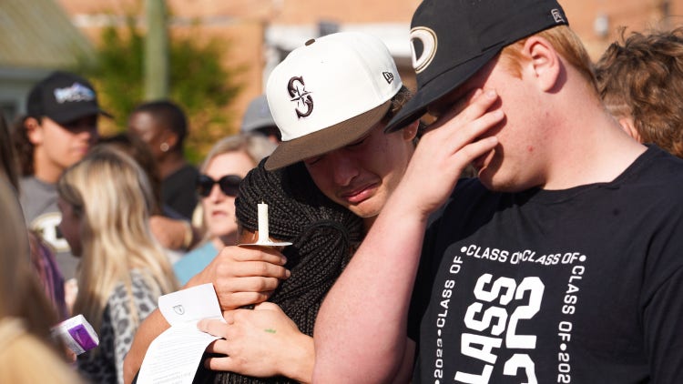 Mourners in Dadeville, Alabama