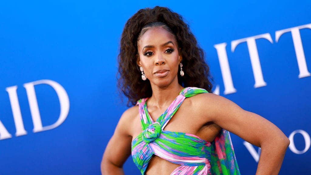 Kelly Rowland wears backless cut-out gown with side boob on Insta