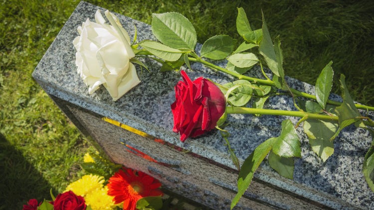 tombstone with flowers