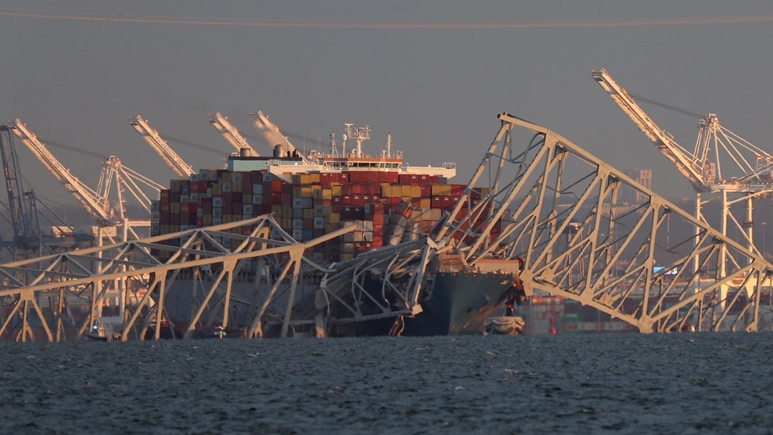 Baltimore's Francis Scott Key Bridge crumbles after cargo ship collision